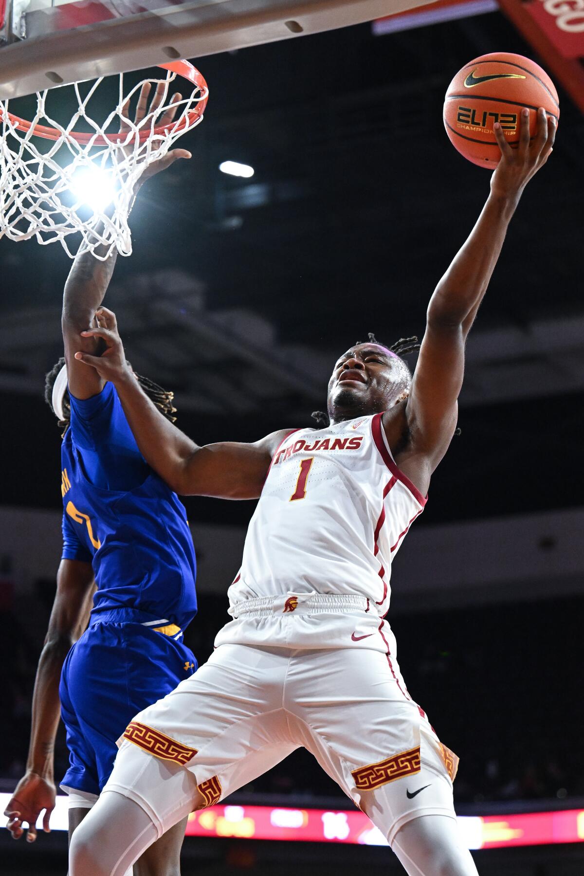 USC's Isaiah Collier shoots over Cal State Bakersfield's Tom Mark during the first half Thursday at Galen Center.